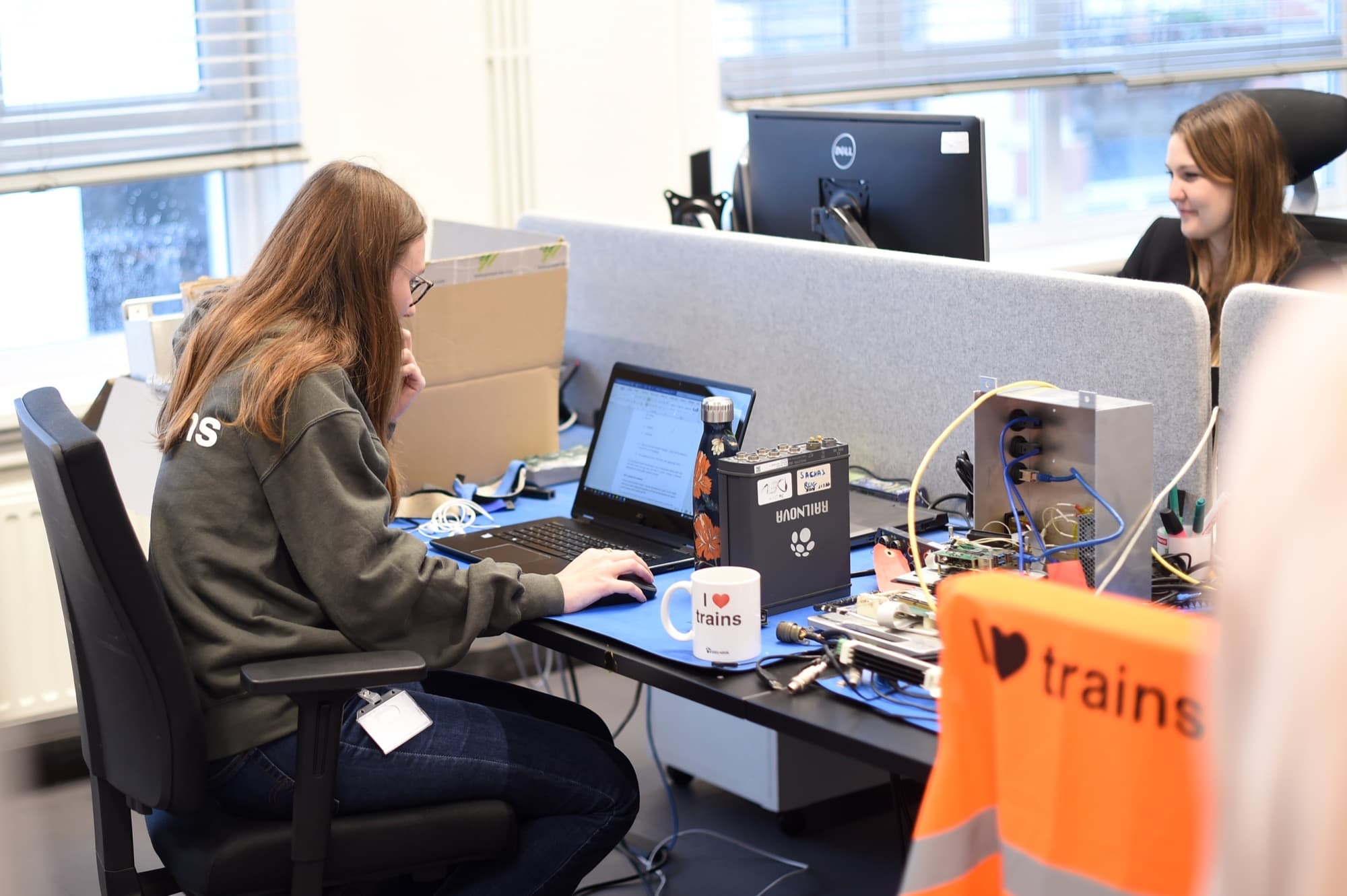 Railnova team members at their desks